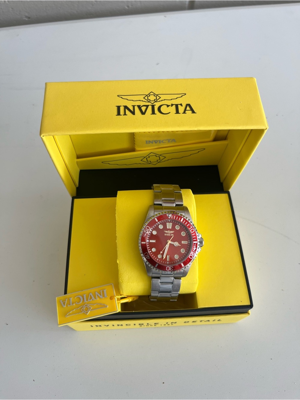 Invicta Men's Silver Stainless Steel Watch with Red Dial and Bezel